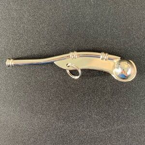 The ACME Boatswain’s Whistle. Polished nickel.